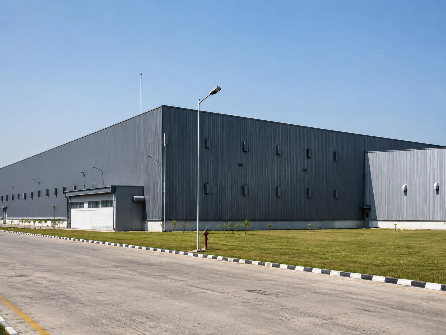 Industrial Building Structural Frame by Synergy PEB Industrial building constructed by Synergy PEB